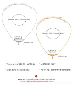 Detailed view of angel wing body chains with specific measurements in gold and silver finish