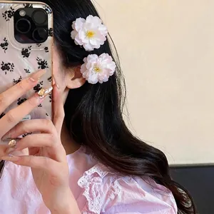 Pair of sweet pink fabric cherry blossom hair clips for women's elegant hairstyling