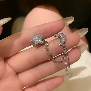 Niche design silver star and moon integrated ear cuff earring with crystal tassel