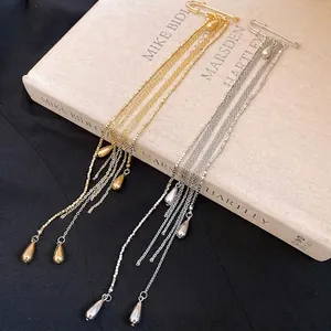 Retro metal water-drop tassel brooch with elegant long chain design