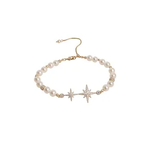 Elegant 18k gold plated pearl bracelet featuring sparkling zircon North Star charms
