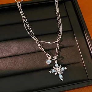 Elegant double-layer silver chain necklace with blue zircon cross pendant and heart charm