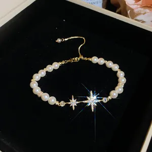 Elegant 18k gold plated pearl bracelet with sparkling zircon star charms in a gift box