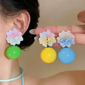 Vibrant resin flower drop earrings featuring colorful round spheres for a sweet, chic style