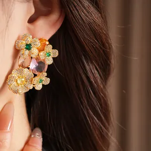 Detail view of vintage floral zircon stud earring featuring colorful gemstone clusters.