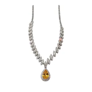 Luxurious silver-toned necklace with yellow pear-shaped zircon pendant