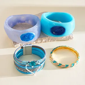 Collection of resin bangles, multilayer leather heart bracelet and enamel wave bangle