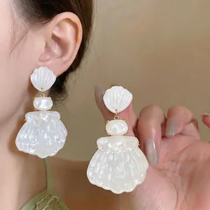French style pearlescent shell dangle earrings in elegant white resin