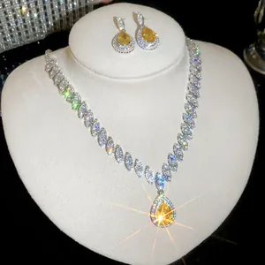 Detailed view of luxury yellow pear-cut zircon necklace and matching earrings jewelry set