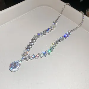 Macro view of luxury water-drop zircon necklace featuring sparkling marquise-cut stones.