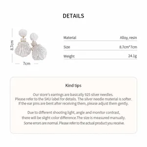 Product details and measurements for large white shell resin earrings with silver needles.