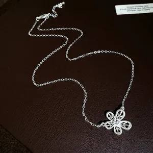 Elegant silver necklace with hollow zircon flower pendant for stylish women jewelry