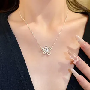 Elegant zircon hollow-out flower pendant necklace on a delicate silver chain