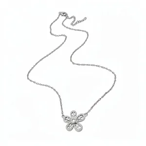 Elegant hollow flower pendant necklace with clear zircon centerpiece and silver finish