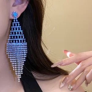 Glamorous silver-plated rhinestone tassel drop earrings in a bold rhombus design