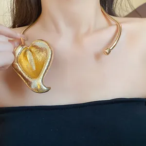 Elegant vintage gold floral neck collar choker jewelry detail shown on Asian model neck