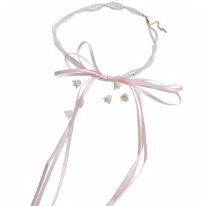 Elegant sweet pink ribbon bow pearl beaded necklace with lily of the valley floral charms