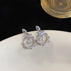 Elegant silver flower lace stud earrings with sparkling zircon teardrop pendants