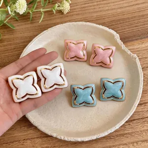 Elegant Korean style enamel star flower stud earrings in white, pink, and blue gold tones