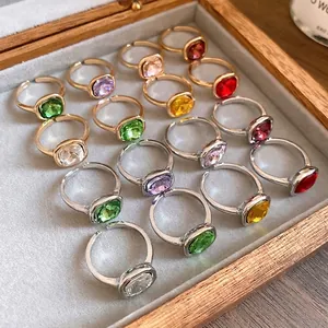 Elegant vintage-style square gemstone open rings in gold and silver metal finishes.