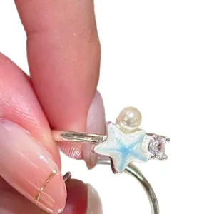 Silver open ring with blue starfish, pearl, and zirconia summer design
