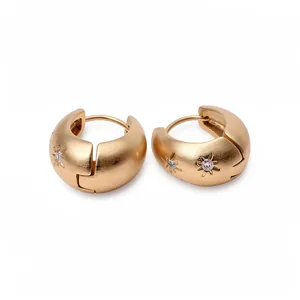 Vintage matte gold hoop earrings with starburst engraving and clear sparkling stones