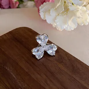 Elegant silver zircon heart flower clip-on earring for non-pierced ears with luxury design