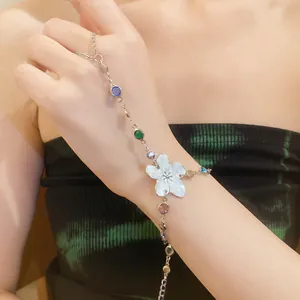 Detail view of floral slave bracelet with colorful rhinestones and silver chain