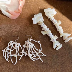 Elegant French style shell fragment and beaded tassel hook earrings for vacation style