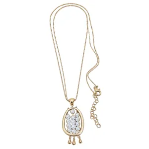 Elegant gold-tone vintage oval pendant necklace featuring delicate white pearls on white background