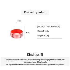 Detailed view of striped resin bangle showing material, weight, and 8cm dimensions.