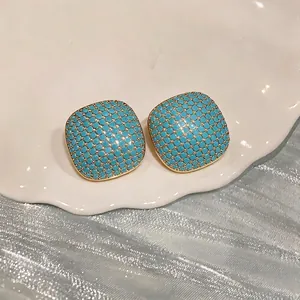 Luxury vintage-style square geometric stud earrings with turquoise blue and gold detailing