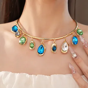 Detailed view of a luxury gold choker featuring vibrant multi-colored water drop gemstones.