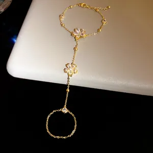 Exquisite 14k gold plated finger bracelet with zircon flower detail for a vintage look
