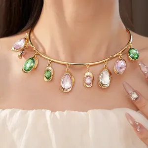 Detailed view of an elegant gold-tone choker necklace with colorful crystal drops.