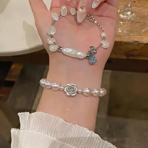 French Style Irregular Artificial Pearl Bracelet With Camellia Rose Pendant Alloy Rhinestone Hand Chain For Women Jewelry