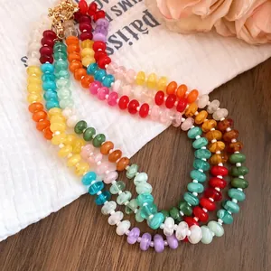 Vibrant rainbow acrylic beaded necklace with irregular colorful charms and gold clasp