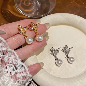 Elegant butterfly pearl drop earrings with 18k gold plating and zircon