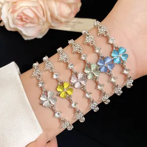 Detailed close-up of sweet cat eye stone clover bracelets with sparkling zircon stones