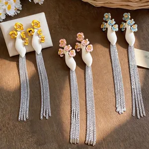 Long tassel earrings with colorful enamel flowers in yellow pink blue for vacation