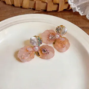Elegant French-style pink flower stud earrings with delicate pearls and crystals