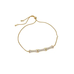 18k gold plated bamboo knot bracelet with pavé zirconia and adjustable slider chain.