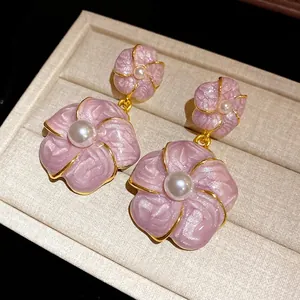 French retro style pink flower drop earrings featuring elegant white pearl centers