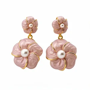 Elegant French vintage pink enamel flower earrings with white pearls and gold accents.