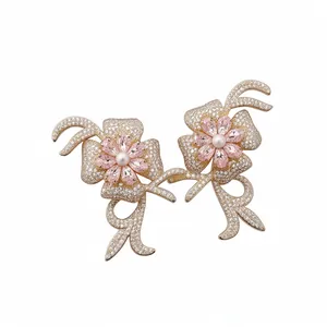 Elegant 18k gold plated flower stud earrings with pink zircon and central pearl accents