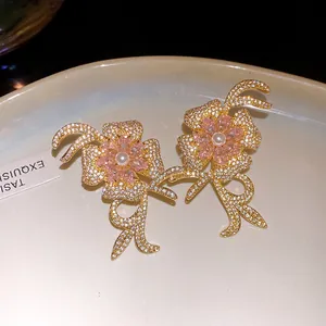 Exquisite 18k gold plated flower earrings with pink sparkling zirconia and white pearls