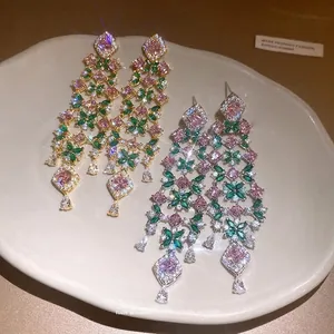Elegant 18k gold plated flower tassel earrings with sparkling pink and green zircons.