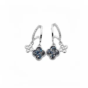 Elegant silver earrings with dark blue four-leaf clover crystals and flower charms