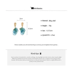 Detailed size and material info for island style shell tassel earrings in gold and blue.