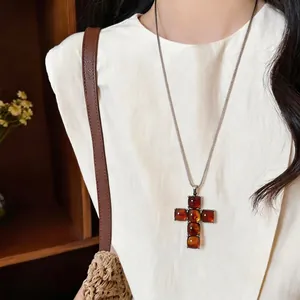 Vintage resin cross pendant necklace with amber stones on long chain